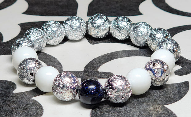 Unisex Silver Electroplated Lava Stone & White Porcelain Stretch Bracelet With A Blue Sandstone Focal Bead